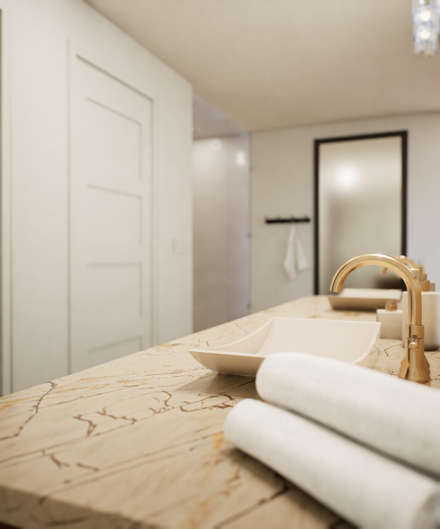 Marble vanity with brass faucet, shallow depth of field